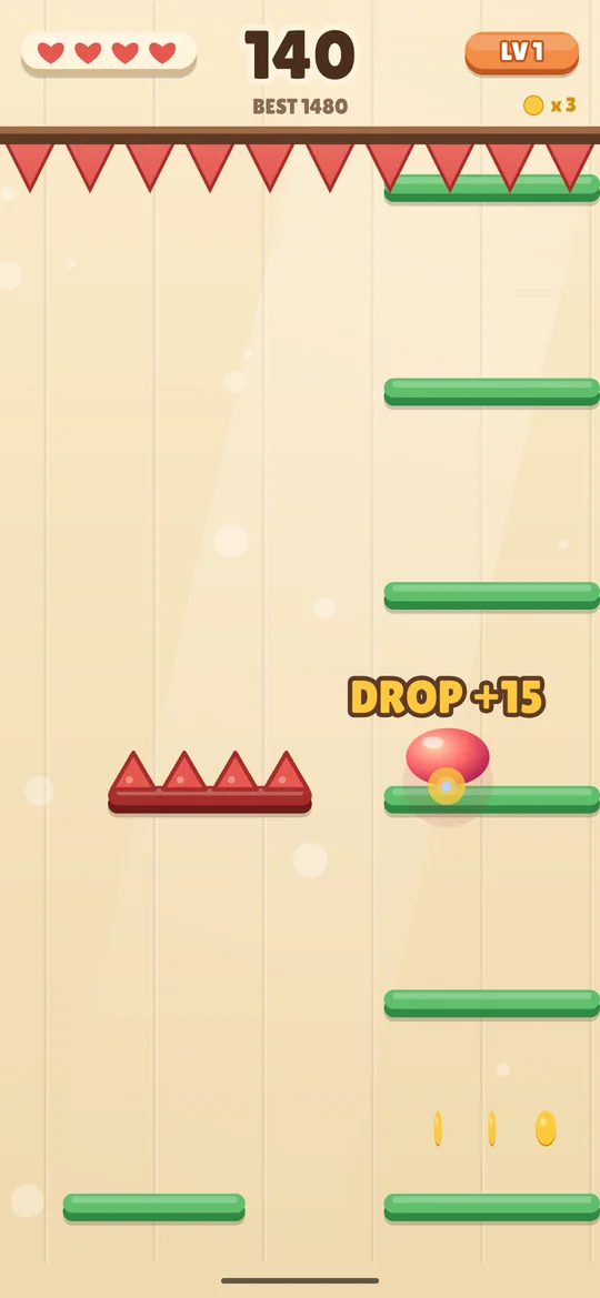 Spike Drop gameplay: a red ball dropping between green platforms below a ceiling of spikes